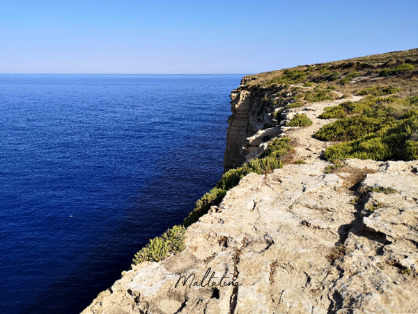 trekking alonside cliffs malta